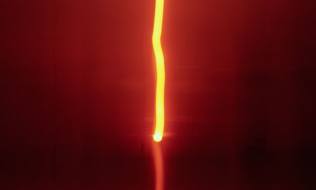 vertical yellow light stripe in red environment